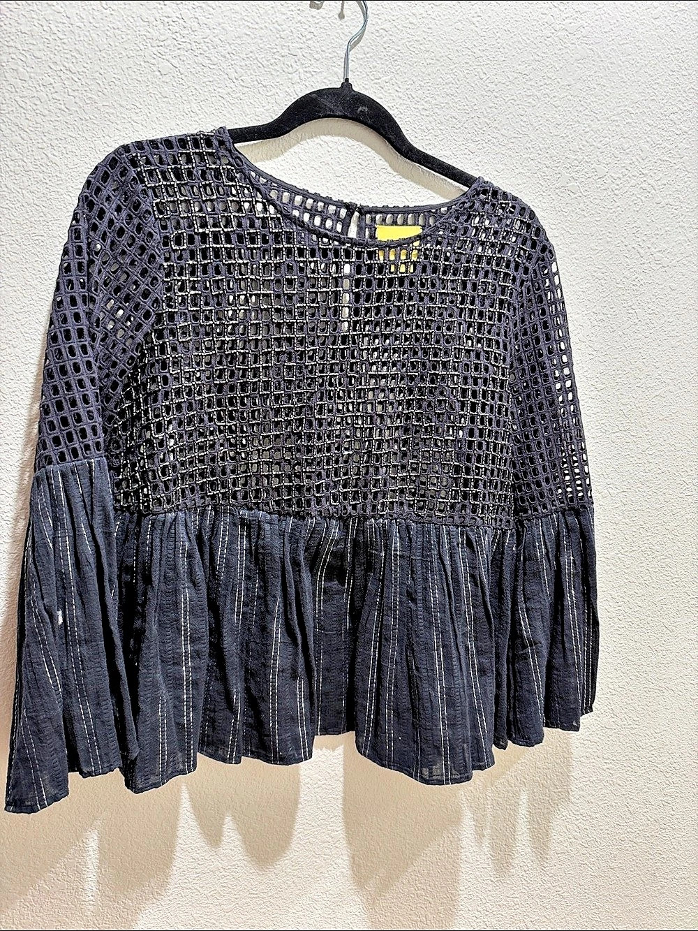 Black Geometric Peplum Blouse with many beautiful features, NEW.